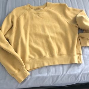yellow sweatshirt
